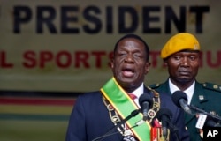 Zimbabwe's President Emmerson Mnangagwa speaks after being sworn in at the presidential inauguration ceremony in the capital Harare, Zimbabwe, Nov. 24, 2017.