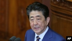 Japanese Prime Minister Shinzo Abe delivers a policy speech in Tokyo, Monday, Jan. 20, 2020. Abe said Monday that Japan will form a space defense unit to protect itself from potential threats as rivals develop missiles and other technology and the…