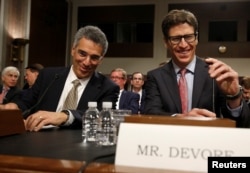 Leonard Cali, senior vice president for global public policy at AT&T Inc., and Andrew DeVore, vice president and associate general counsel at Amazon.com Inc., speak before testifying before the Senate Commerce, Science and Transportation Committee on safeguards for consumer data privacy in Washington, Sept. 26, 2018.