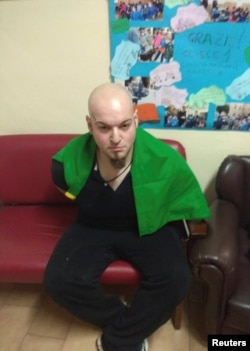 Luca Traini, 28, suspected by the police of opening fire on African migrants, is seen in Macerata, Italy, Feb. 3, 2018.