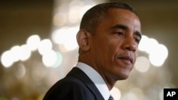 FILE - President Barack Obama in the East Room of the White House in Washington.