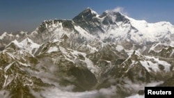 FILE - Mount Everest, the highest peak in the world, is seen in this aerial view March 25, 2008. 