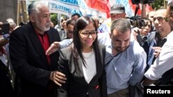 Venezuela's Foreign Minister Delcy Rodriguez (C) leaves Argentina's Foreign Ministry at San Martin palace, where the Mercosur summit was being held, in Buenos Aires, Argentina, Dec. 14, 2016. 