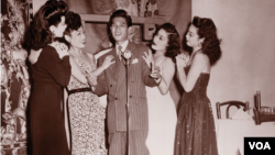 Larry Ching, “the Chinese Frank Sinatra,” with fellow performers at the Forbidden City nightclub in the early 1940s (Courtesy DeepFocus Productions, Inc.).