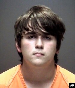 This photo provided by the Galveston County Sheriff's Office shows Dimitrios Pagourtzis, who law enforcement officials took into custody May 18, 2018.