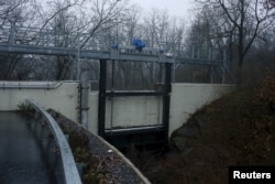 FILE - The sluice gate of the Boman Avenue Dam is pictured in Rye, New York, December 23, 2015. Iranian hackers breached the control system of a dam near New York City in 2013.