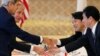 US, Japan Agree to Bolster Defenses 