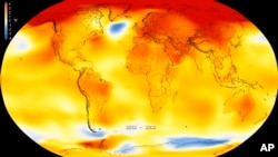 This map made available by NASA in February 2019 shows global surface temperature anomalies for 2014-2018. Higher than normal temperatures are shown in red and lower than normal temperatures are shown in blue. (Kathryn Mersmann/NASA - Scientific Visualiza