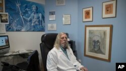 Professor Didier Raoult, director of the Mediterranean institute of infection poses for a portrait at La Timone hospital in Marseille, France, Feb. 27, 2020. 
