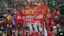 A huge banner in support of Mary Jane Veloso, a Filipino convicted drug trafficker who was spared from execution by firing squad in Indonesia, May 1, 2015.