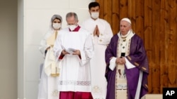 Pope Francis celebrates Mass at the Franso Hariri Stadium in Irbil, Kurdistan Region of Iraq, March 7, 2021.