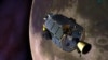 An artist's rendition provided by NASA shows the Lunar Atmosphere and Dust Environment Explorer (LADEE) spacecraft orbiting the moon as it prepares to fire its maneuvering thrusters to maintain a safe orbital altitude, April 18, 2014.