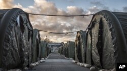 FILE - A new migrant reception camp is seen in Vordingborg, 100 km south of Copenhagen, Denmark, Nov. 26, 2015. The camp has the capacity to hold up to 2,000 people.