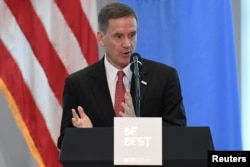 USAID administrator Mark Green introduces U.S. first lady Melania Trump at a reception on her initiative "Be Best" at the United States mission to the U.N. on the sidelines of the United Nations General Assembly in New York, Sept. 26, 2018.