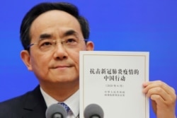 中共中央宣传部副部长、国务院新闻办公室主任徐麟在白皮书发布会上。（2020年6月7日）