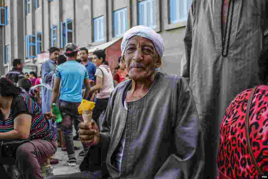 Adel Hanna Botros, 62 from Aswan says “I used to come with my Muslim friends every year, but this year they have been panned, I know many Muslims, they respect and love Virgin Mary so much” in Assiut, Egypt, August 20, 2017. (H. Elrasam/VOA)