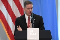 FILE - USAID administrator Mark Green introduces U.S. first lady Melania Trump at a reception on her initiative "Be Best" at the United States mission to the U.N. on the sidelines of the United Nations General Assembly in New York, Sept. 26, 2018.