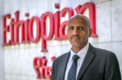 FILE - Tewolde Gebremariam, Chief Executive Officer of Ethiopian Airlines, poses for a photograph after speaking to The Associated Press at Bole International Airport in Addis Ababa, March 23, 2019.