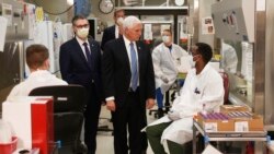 Vice President Mike Pence visits the molecular testing lab at Mayo Clinic Tuesday, April 28, 2020, in Rochester, Minn., where he toured the facilities supporting COVID-19 research and treatment. Pence chose not to wear a face mask while touring the…