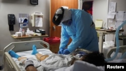 Pacijent u bolnici u Hjustonu, u Teksasu, 12. novembar 2020. (Foto: Rojters/Callaghan O'Hare)