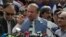 FILE - Nawaz Sharif addresses a crowd during his visit to a mausoleum of Pakistani poet Mohammad Iqbal on the occasion of Pakistan Independence Day in Lahore, Aug. 14, 2017.
