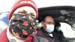 Mother Lauren Stanley gives communion during #ChurchOnTheGo services on the Rosebud. (Courtesy: Rev.  Lauren Stanley)