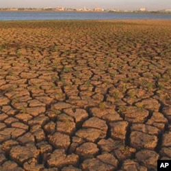 Parched soil by the White Nile in Sudan. Some scientists say drought brought on by climate change contributes to such cases of land degradation
