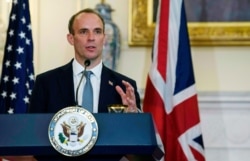 FILE - British Foreign Secretary Dominic Raab speaks at a press conference with Secretary of State Mike Pompeo at the State Department, Sept. 16, 2020, in Washington.