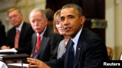 U.S. President Barack Obama meets with health insurance chief executives at the White House in Washington, Nov. 15, 2013. 