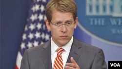 Jurubicara Gedung Putih Jay Carney menyatakan kekecewaan atas penolakan Kongres untuk menyetujui misi di Libya.