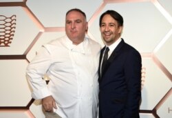 FILE - Chef Jose Andres, left, and actor Lin-Manuel Miranda attend the grand opening of the Shops & Restaurants at Hudson Yards, March 14, 2019, in New York.