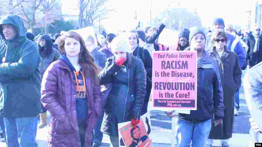 Milhares marcharam pelas ruas da capital americana em protesto contra a brutalidade policial. Dez. 13, 2014