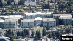 FILE - Apple's headquarters, in an aerial photo taken April 6, 2016. on Infinity Loop in in Cupertino, California, part of Silicon Valley. 