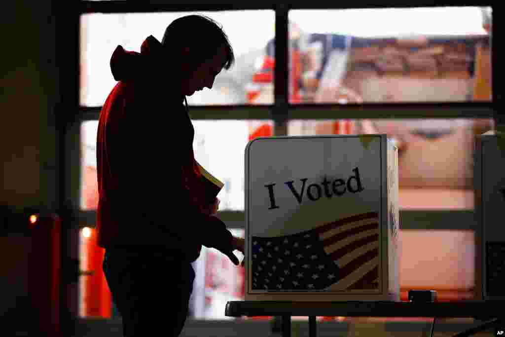 A voter casts a ballot in the South Carolina primary election, Feb. 29, 2020, in Columbia, S.C. 