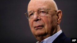 Klaus Schwab, founder and Executive Chairman of the World Economic Forum, poses during an interview by the Associated Press on the eve of the forum, WEF, in Davos, Switzerland, Jan. 20, 2019. 