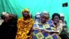 FILE - Remaining girls who were kidnapped from the northeast Nigerian town of Chibok are seen in an unknown location in Nigeria in this image from undated video obtained on Jan. 15, 2018. 