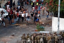 Lebanese soldiers clash with supporters of Prime Minister-designate Saad Hariri, who stepped down in Beirut, Lebanon, July 15, 2021.