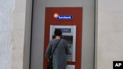 Greece lift the last remaining restrictions, Sept. 2, 2019, imposed on bank depositors more than four years ago at the height of the country's financial crisis.