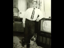 FILE - Emmett Louis Till, the murdered Chicago teenager whose body was found in the Tallahatchie River, Mississippi, in 1955.
