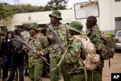 Kenyan soldiers assigned to polling stations get their instructions in Nairobi, Kenya, Aug. 7, 2017.