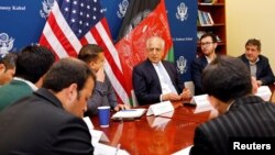 FILE - U.S. special envoy for peace in Afghanistan, Zalmay Khalilzad, center, speaks during a roundtable discussion with Afghan media at the U.S Embassy in Kabul, Afghanistan Jan. 28, 2019.