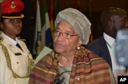 FILE - Liberia President, Ellen Johnson Sirleaf, is photographed after the ECOWAS Heads of State and Government summit in Abuja, Nigeria, Dec. 17, 2016.