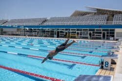 Ibrahim al-Hussein, saat berlatih di Olympic Aquatic Centre, Athena, Rabu, 30 Juni 2021. (AP)
