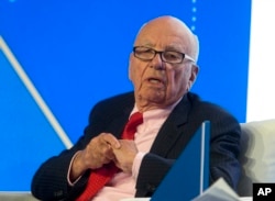 Rupert Murdoch, executive chairman of News Corporation, speaks during a panel discussion at the B20 meeting of company CEOs in Sydney, Australia, July 17, 2014.