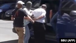 UKRAINE -- Ukrainian security service (SBU), officers arrest the alleged mastermind of an alleged Russian plot designed to kill prominent Russian anti-Kremlin journalist, war correspondent and former soldier Arkady Babchenko