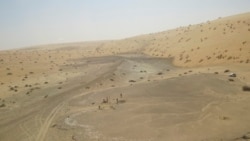 This undated photo provided by the Palaeodeserts Project in September 2021 shows the site of Khall Amayshan 4 in northern Saudi Arabia, where evidence of repeated visits by early humans over the last 400,000 years was found. The visits were connected with the remains of ancient lakes. (Michael Petraglia/Palaeodeserts Project via AP)