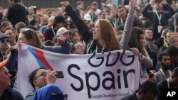 Attendees cheer while waiting for the keynote address of the Google I/O conference in Mountain View, Calif., Tuesday, May 7, 2019. (AP Photo/Jeff Chiu)