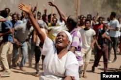 Supporters of Bekele Gerba, secretary general of the Oromo Federalist Congress (OFC), chant slogans to celebrate Gerba's release from prison, in Adama, Oromia Region, Ethiopia, Feb. 14, 2018.