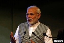 India's Prime Minister Narendra Modi speaks at the inauguration of a hydroelectric power plant in the state of Jammu and Kashmir, May 19, 2018.