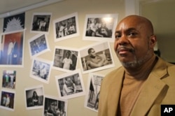 Tommie Bosley stands for a portrait in his office in Chicago, Nov. 9, 2018. Bosley, a former banker, heads Strong Futures, a jobs-mentoring program at St. Sabina for young adults, many with criminal pasts, who are now looking to get a new start on life.